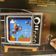 Imagen para el artículo titulado Lo nuevo de Lego y Nintendo es una NES y un televisor hechos en Lego para jugar a Super Mario Bros